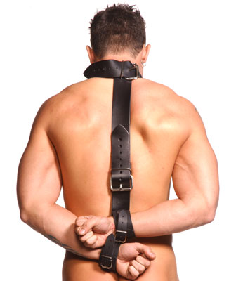 The Strict Leather Leather Neck to Wrist Restraint is an affordable, effective bondage device. It forces the wearer in a more rigid position than traditional behind the back restraints. It is adjustable by means of rolling buckles. Collar fits necks 14-20 inches in circumference. Wrist cuffs are designed to fit all sizes.
